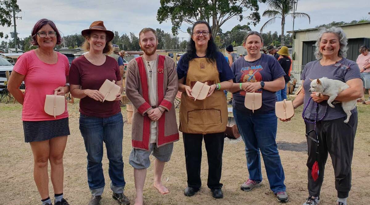 Sea Wolves' Ben Radcliffe (third from left) with members of his workshop and their traditional leather bag creations. Picture supplied