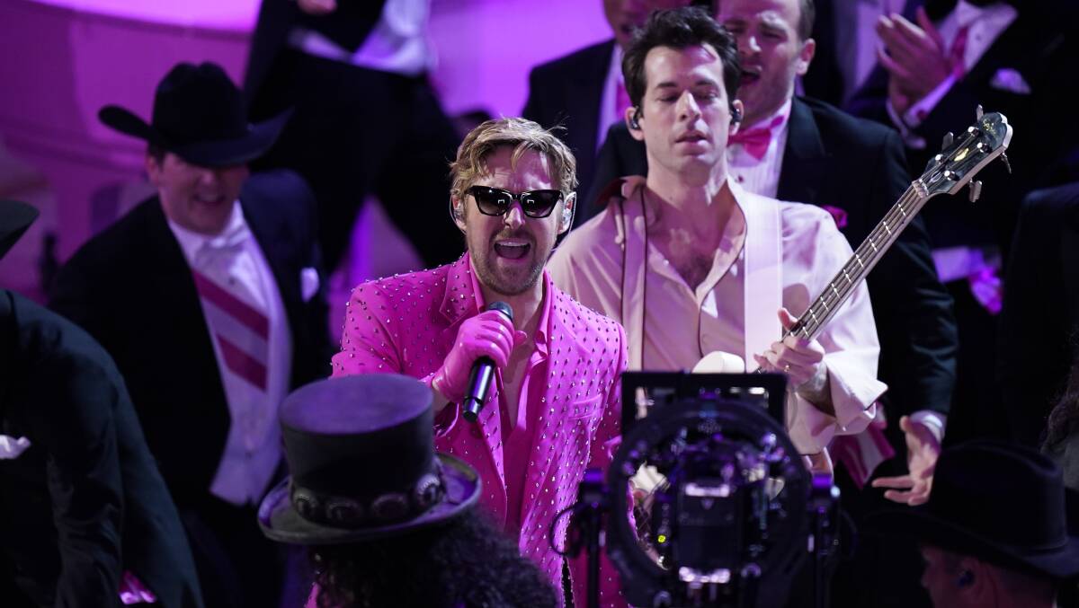Ryan Gosling performs with Mark Ronson during the 96th Oscars. Picture by Jack Gruber-USA TODAY/Sipa USA /AAP Image