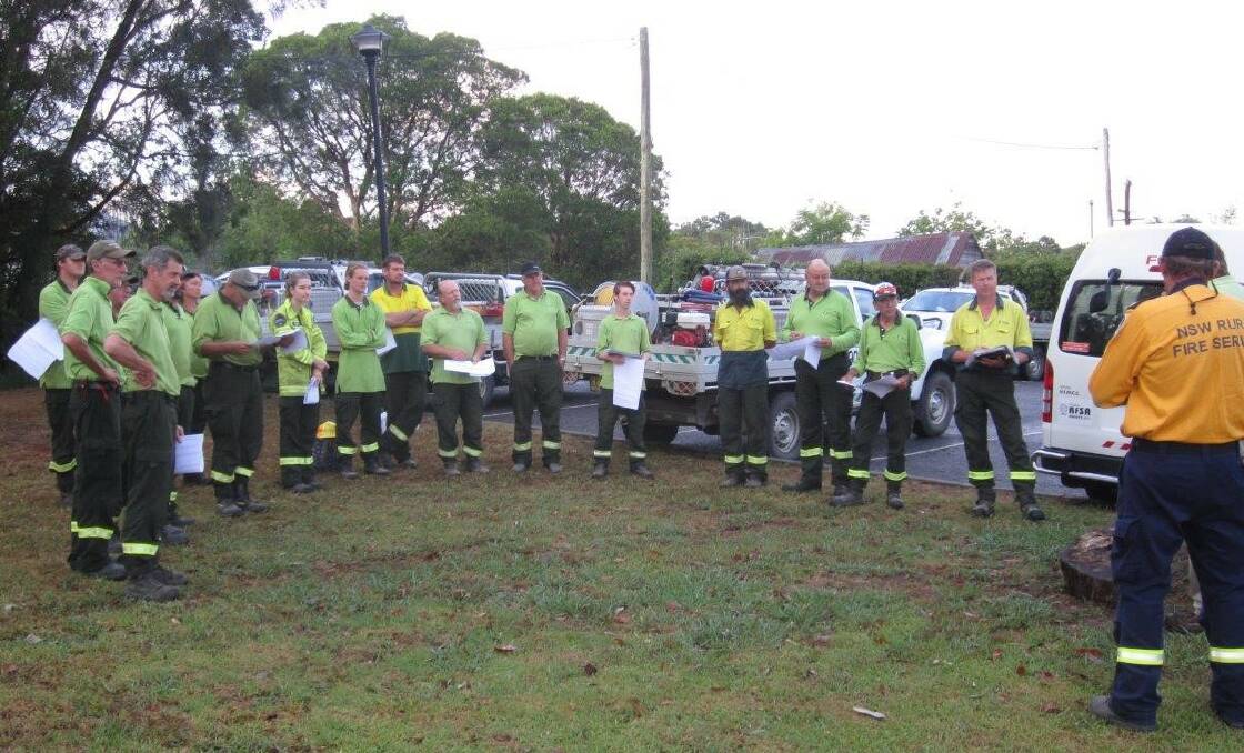 DEPLOYMENT: Forestry Corporation crews from Eden, Narooma, Batemans Bay and Wauchope being briefed outside Wauchope Fire Control centre during last week's wild fires. Picture: Forestry Corporation of NSW.