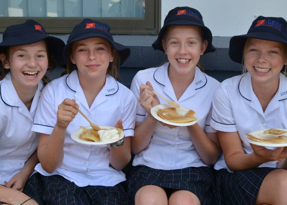 Philipa Keogh, Julia Cullenward,  Abigail Jones and Bonnie Giles tuck in to some nourishing pancakes to celebrate Shrove Tuesday.