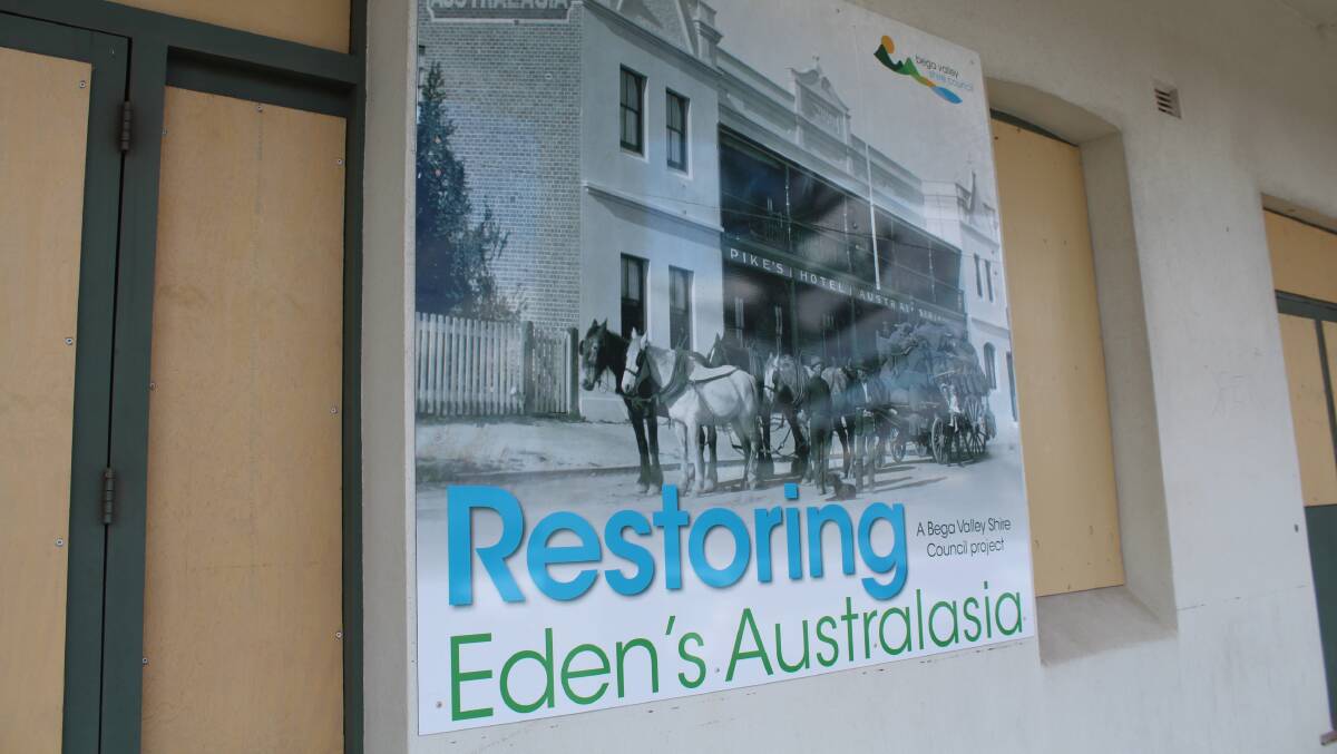 SIGN OF THE TIMES: The newly erected sign next to boarded-up windows on the facade of Eden's iconic Hotel Australasia. Picture: Liz Tickner
