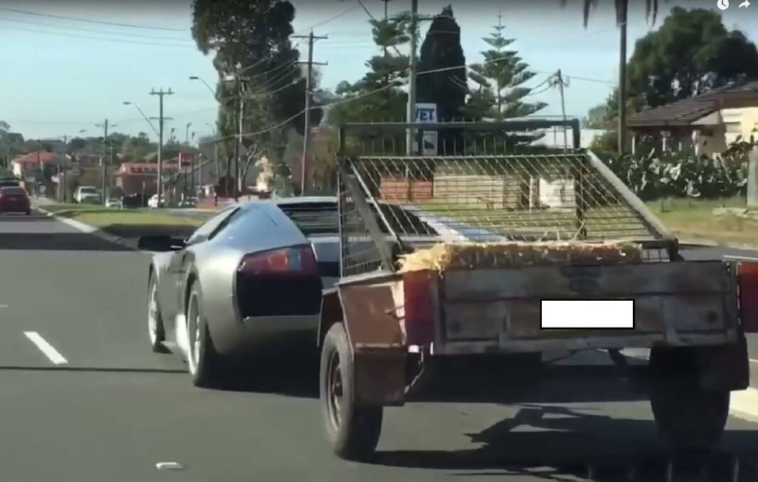 The Lamborghini Murcielago filmed towing a crate of goats through Sydney's south-west last Friday. The picture is a still from a YouTube video by Joseph Criniti. 