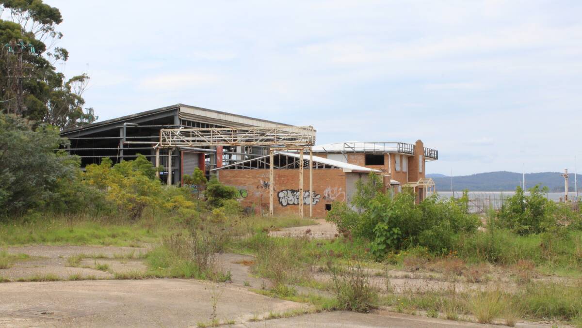 DEMOLITION:  Dilapidated buildings at Eden's old cannery at Cattle Bay are to be demolished. The structures are known to contain asbestos. A new marina is planned for the site. Picture: Liz Tickner 