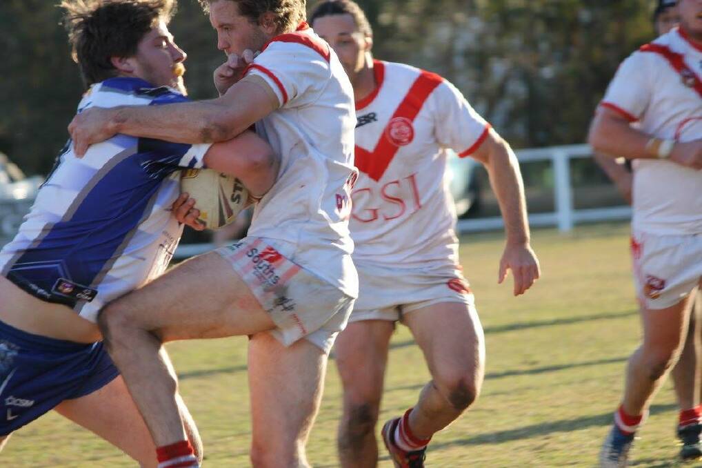 NEIGHBOURS DISPUTE: Traditional rivals Eden and Merimbula-Pambula toughed it out on Sunday, with the Bulldogs bringing an end to the Tigers' season. Picture: Merimbula-Pambula Bulldogs
