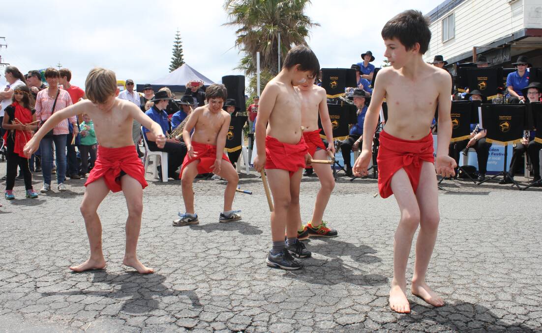 TRADITION: Eden Public School's Koori Dance Crew perform for the Eden Whale Festival crowds on Saturday.