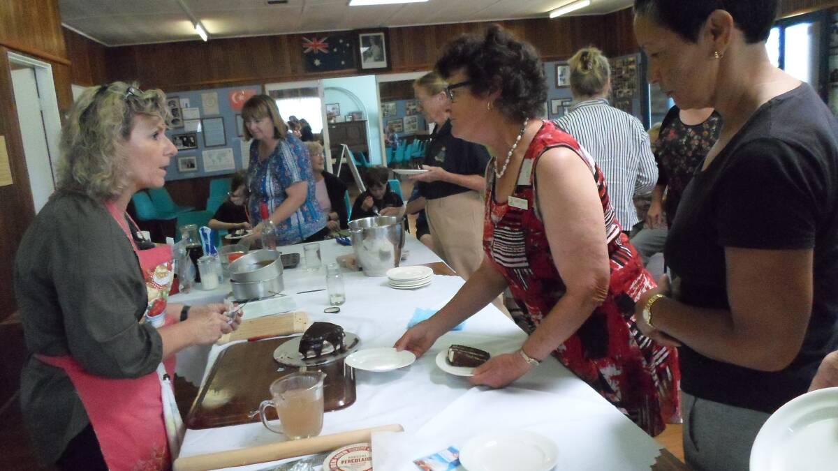 PASTRY QUEEN: Nelleke Gorton demonstrates her favourite baking methods to visitors at Friday's event hosted by the Eden CWA.