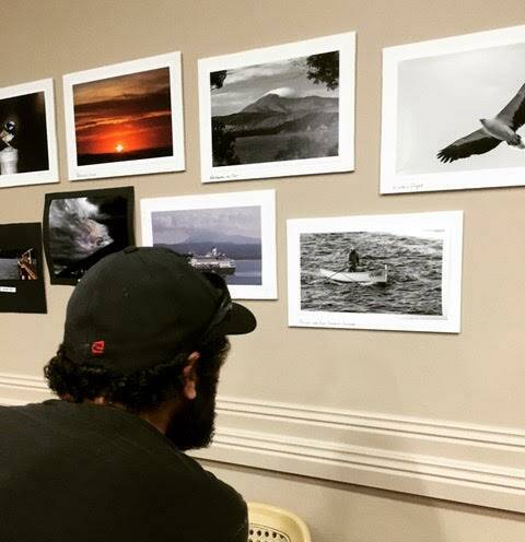 A visitor checking out the photo exhibition at last year's Whale Festival. 