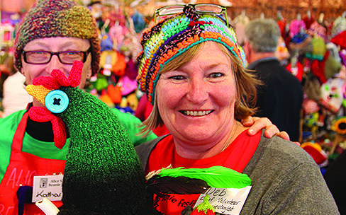 Beanie volunteers Deb White and Katharine Jordan with a hardly poultry example of headwear.
