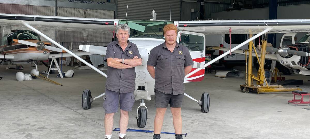 Merimbula Aircraft Maintenance owner and chief engineer Rex Koerbin seen here with apprentice Tom Burn, said Bega Valley Shire Council's handling of the airport leases is affecting his financial viability, Tom Burn's career and his and wife Lynne's wellbeing. Picture supplied