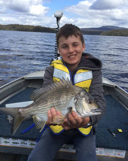 WHAT A CATCH: Despite some recent stormy weather around the Far South Coast, Jaxon Di Donato had no problems fishing as he shows with this lovely 41cm estuary bream he caught.  