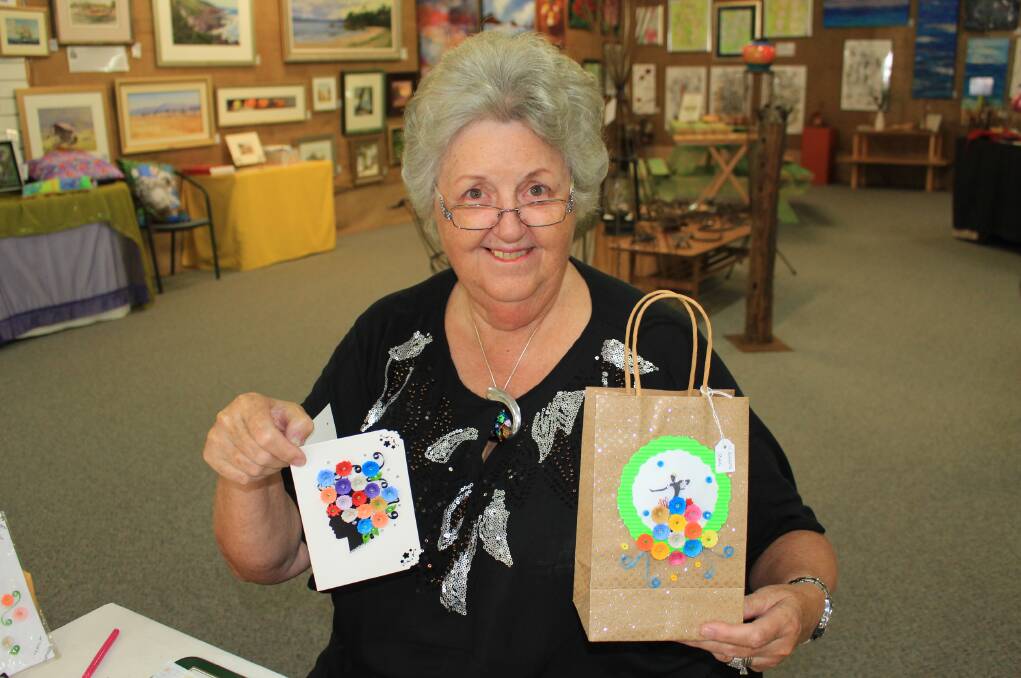 Jenny Roberts shows some of the gifts decorated with paper quilling.