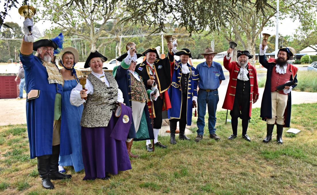 Here ye, here ye: Town criers from interstate gathered at the Australasian Guild of Town Criers’ event in Creswick, Victoria, on December 4. Bega Valley Shire Town Crier Alan Moyse is ringing his bell at front left. Picture courtesy Susan's Photographics SA