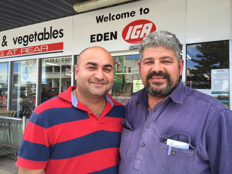 New era: Eden IGA purchaser Sandeep Sandeep with former owner/manager Con Castrissios pictured together on official hand-over day, Monday November 23. Photo: Toni Houston