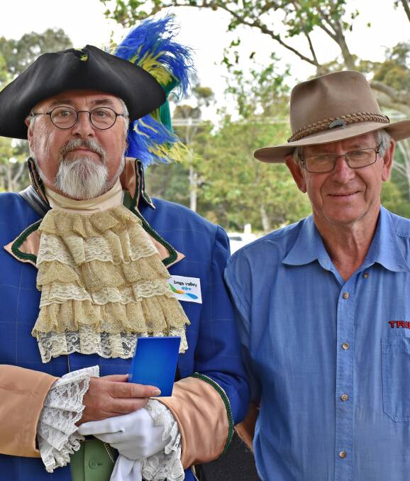Best Cry: Bega Valley Shire Town Crier Alan Moyse (left) accepts award from Hepburn Cr Don Henderson at the Victorian event on December 4, when he competed against eight criers. Picture courtesy Susan's Photographics SA