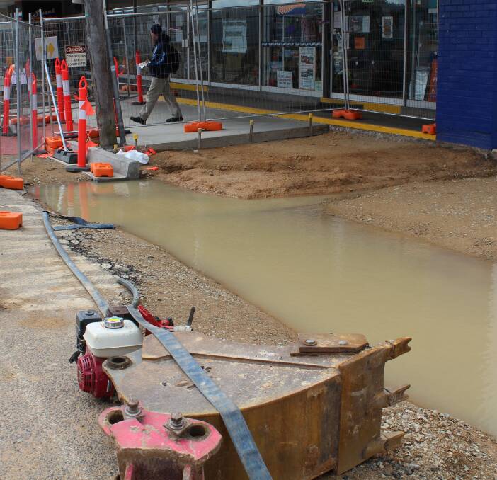 Last week’s rain turned holes into puddles and silenced some machines but Guideline South Coast Civil Engineering Contractors assures Imlay Street works are still on track for a Christmas finish as per the original contract.