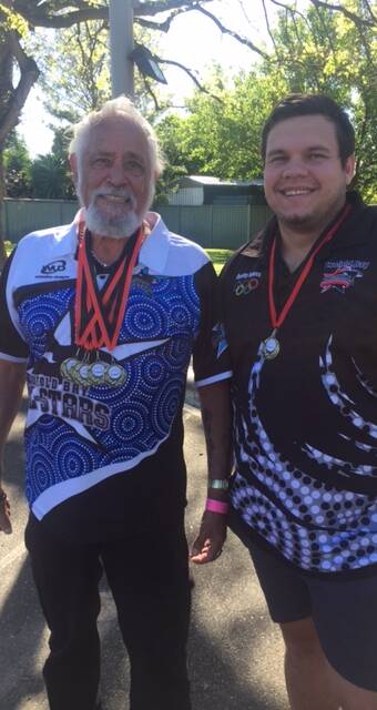 Twofold Allstars' golden boys: Uncle Ossie Stewart (left) and Ivan Broome with their medals from the Mini Koori Olympics. Picture: Joe Stewart