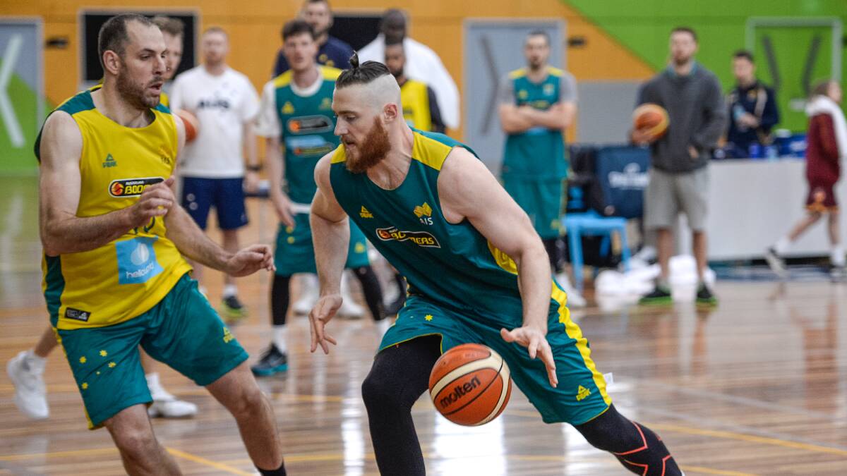 HARD AT IT: The Australian Boomers basketball team go through their paces in the lead-up to the Rio Olympics.