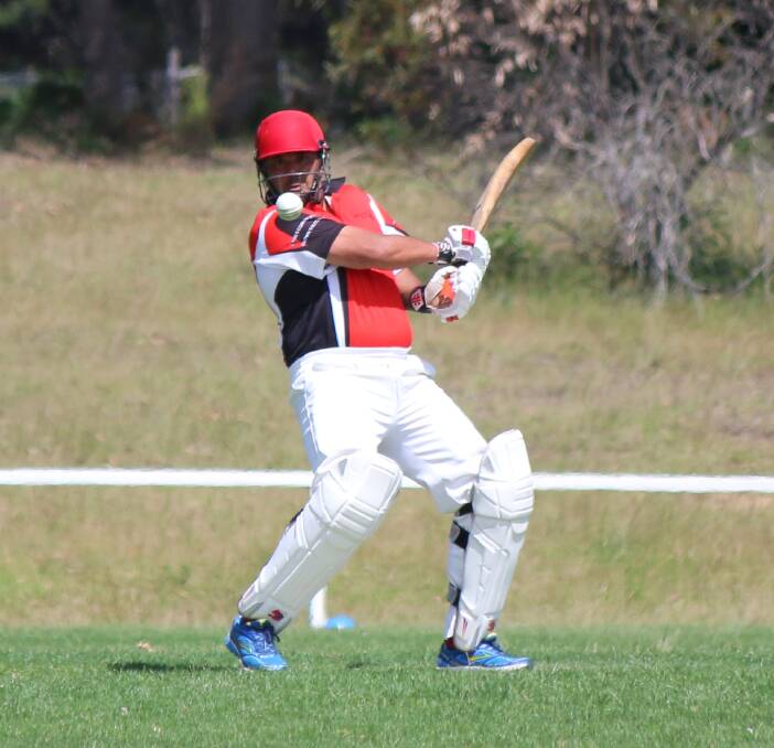 Good hit: Eden batsman Drew Mudaliar watches the ball sail for the fence, hitting 29 against Tathra on Saturday with Eden running down the total quickly. 