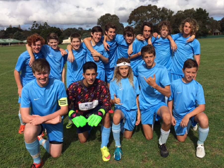 Cheering lads: The Far South Coast Football Association under 15s boys team celebrate a big win in the championships. 