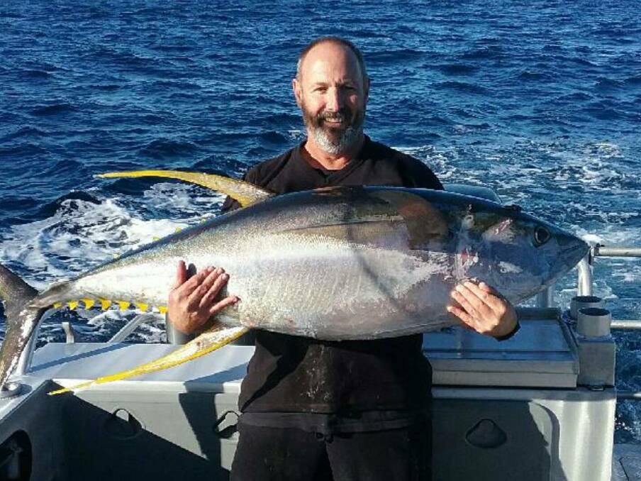 Big catch: Trevor Chippendale of Sea Hog with a magnificient 47kg yellowfin tuna taken during the tournament.