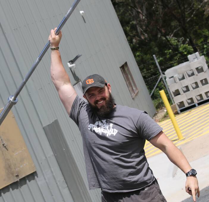 Lift big: Iron Stronghold owner Dan Dakis is excited about hosting grand opening weightlifting events this weekend with powerlifting and strongman events over two days.