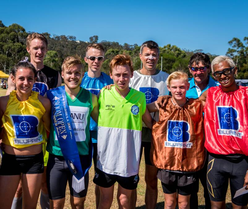 Blazing pace: Race director Ian Lloyd (back right) with runners from the 300 metre event during the Merimbula Gift. Picture: Helen Rushton