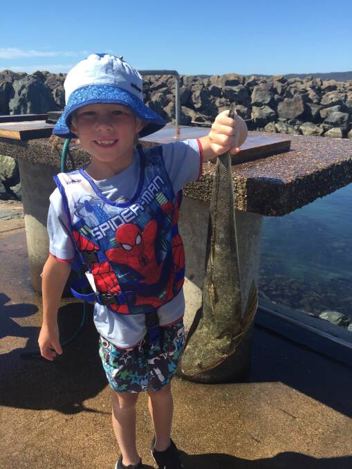 Dayne Brock Carlson is thrilled after bagging a great-size flathead in Eden. 