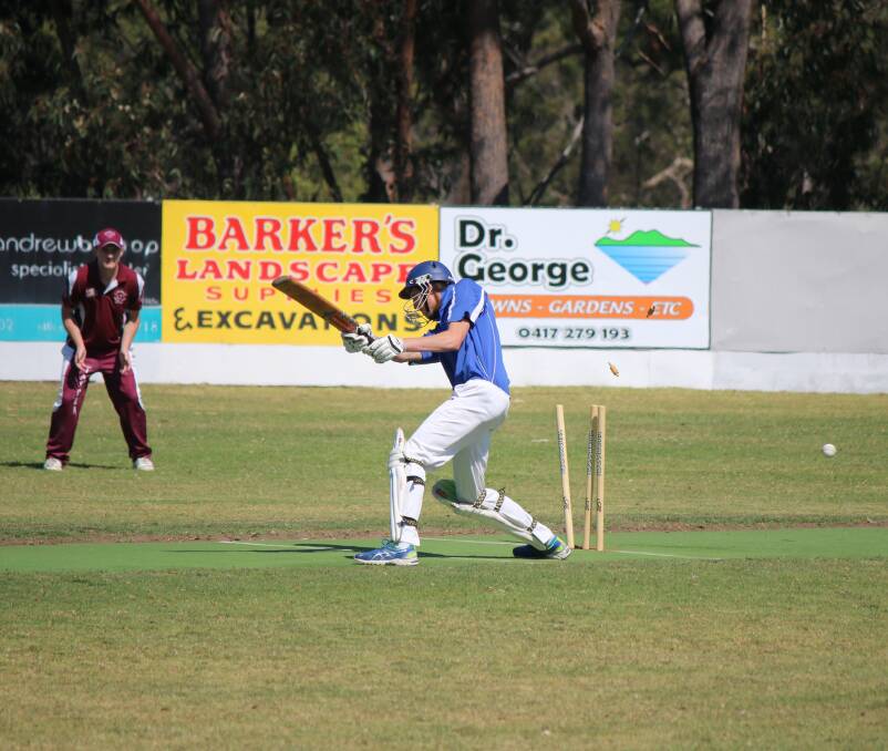 In motion: The bails fly through the air after Kye Overend is bowled by Adam Blacka to close out the Pambula innings on Saturday.