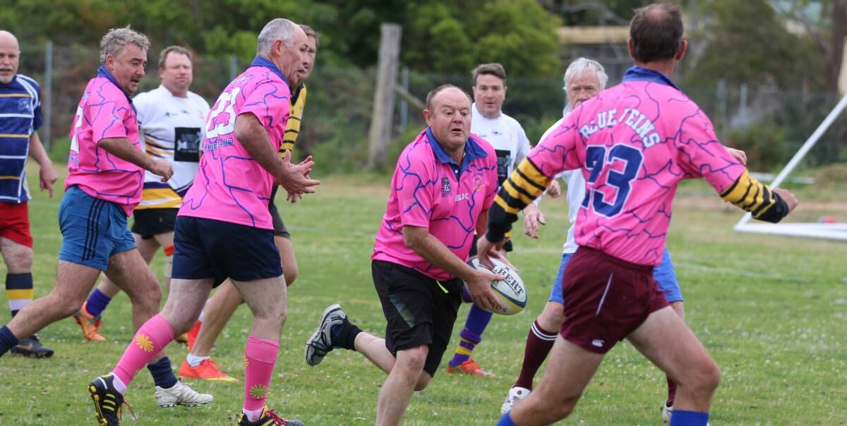 Send it: Howard Blacker fires a pass down the line with the Blue Veins putting on some classy sweeping plays on Saturday during their Golden Oldies carnival. 