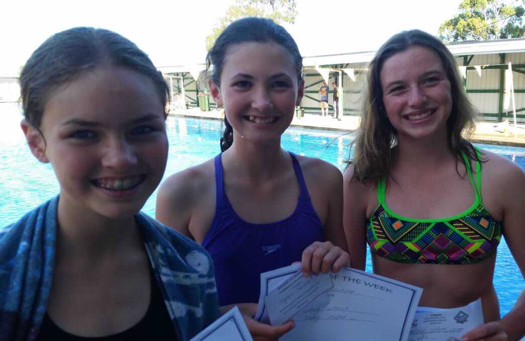 Recognition: Swimmers of the week Holly and Sophie Switzer and Georgia Caldwell have been helping at swim club meets .