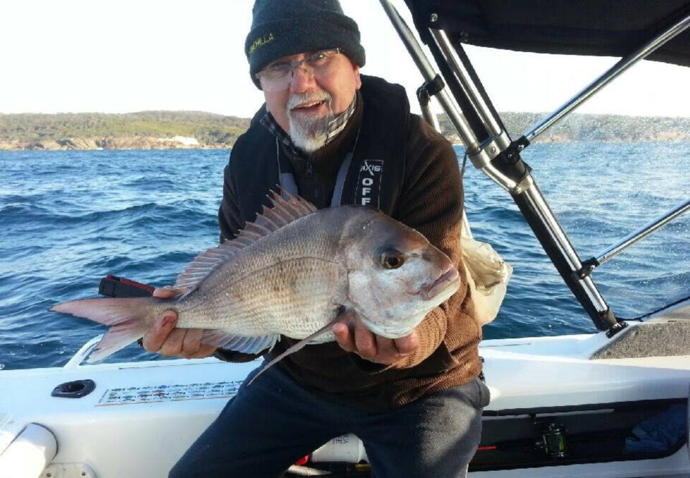 Red letter day: Angler John Bunyan of Tura Beach shows a great snapper taken at White Rock off Kianinny. 