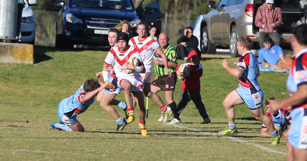 Fast feet: Eden quick Joel Grewar bursts through the Bega line to set up a try after already making a 100-metre solo try effort on Sunday. 
