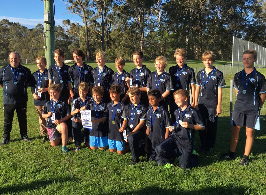 Medal winners: The Far South Coast under 13s rep soccer team celebrates its championship win after knocking over the Shoalhaven roster. Picture: supplied