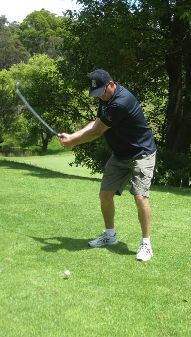 New horizons: Men of League state manager Stuart Raper tees off earlier this year for the charity golf day, which is set to run again on January 8. 