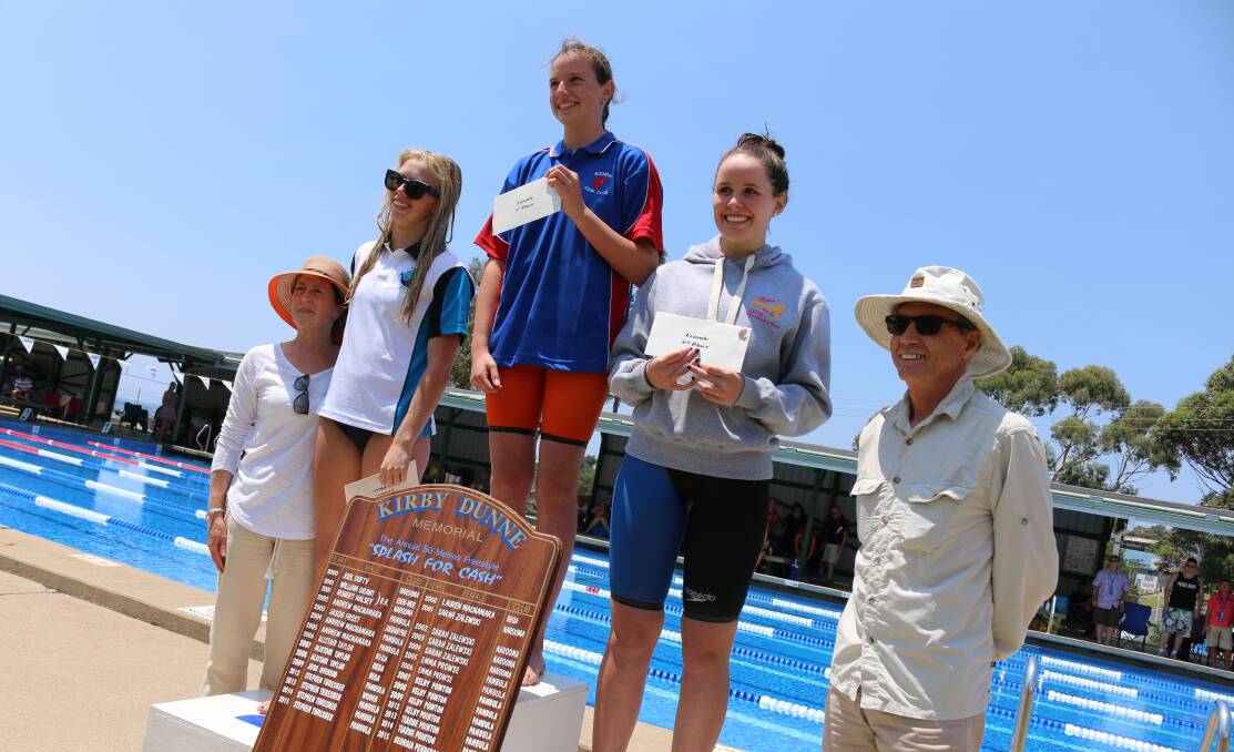 Top swimmers: Julie Dunne, Tiarne Pointon, Georgia Caldwell, Keira Hoyland and Russell Dunne at the podium after the finish of the girls' swim. 