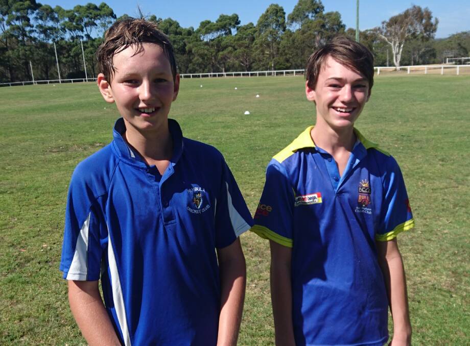Stumped mates: Zak Keogh and Oliver Joyce share a laugh after taking each other's wicket in Saturday's under 14 clash. 