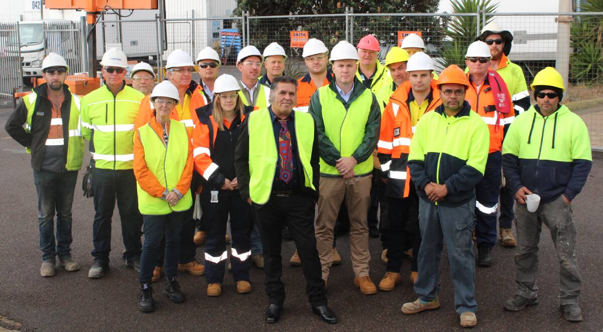 ELALC chair BJ Cruse with workers of the Eden Breakwater Wharf Extension project following a welcome to country on Tuesday.