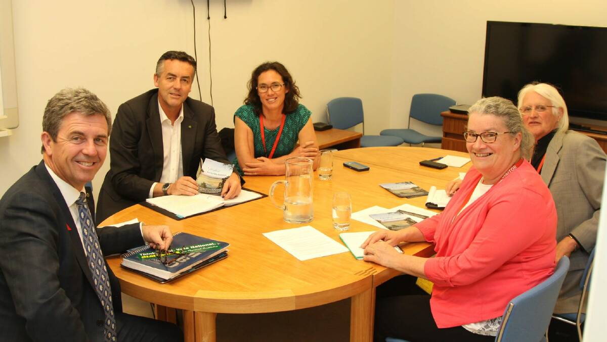 GRANTED: Darren Chester MP with (from left to right) Assistant Minister for Health Dr David Gillespie, Dr Sara Renwick-Lau of the Mallacoota Medical Centre and Dr Tricia Hiley and Robin Bryant from the Mallacoota Community Health Infrastructure and Resilience Fund. Photo: Supplied