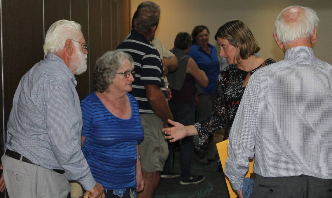 Bega Valley Shire mayor Kristy McBain speaks with community members following Thursday's public forum.