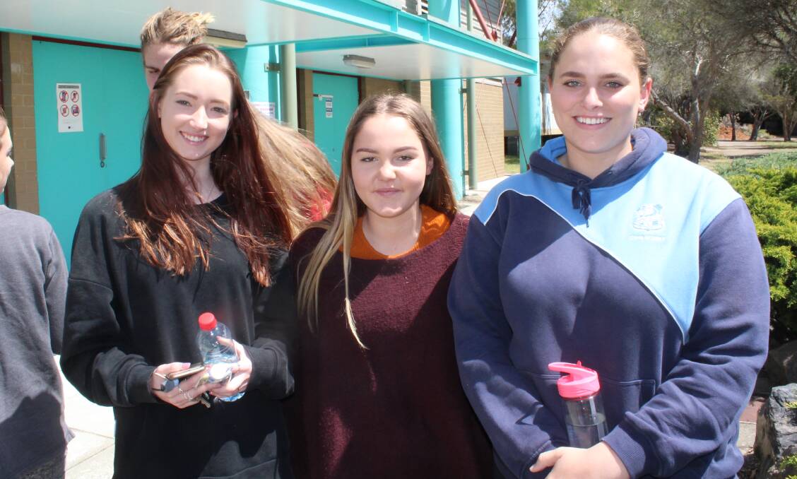ONE DOWN: Eden Marine High School students Taylah Bennett, Brooke Rogers and Katelyn McCarron are feeling good after their first HSC exam on Monday.