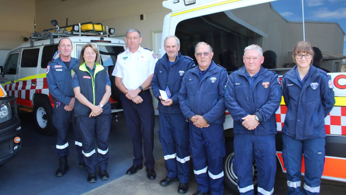 Meeting: (From left) Mallacoota community support coordinator Terry Hogue, Ambulance Victoria East Gippsland group manager Deb Ray, Southern NSW zone manager Mark Gibbs, paramedic Chris Robinson, Bega Valley district inspector Bob Whitney, Eden station officer Steve Marks and paramedic Lauren LaSala.

