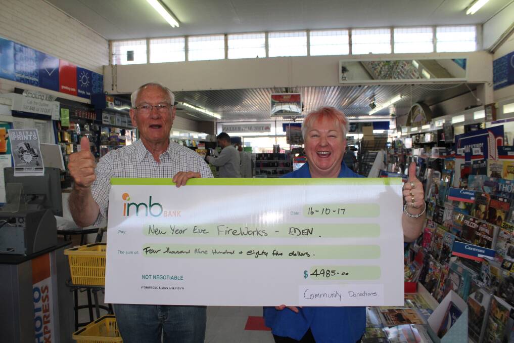 FIRE AWAY: Eden Service and Social Club Inc president Graham Gray and Eden Lioness member Lynn Slater with a cheque for $4985 going towards the fireworks display.
