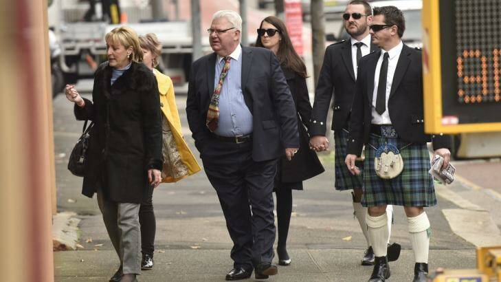 Paul Rossington's brothers wear the family tartan as a tribute to their brother while accompanying their parents and sister to court.  Photo: Nick Moir