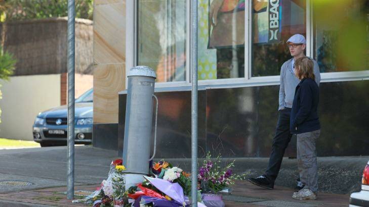 Flowers left for a pedestrian killed after being hit by a bus at an intersection in Beecroft. Photo: Simon Alekna