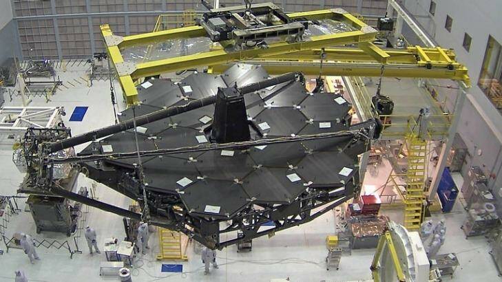 The telescope's huge mirror is carefully installed. Photo: NASA