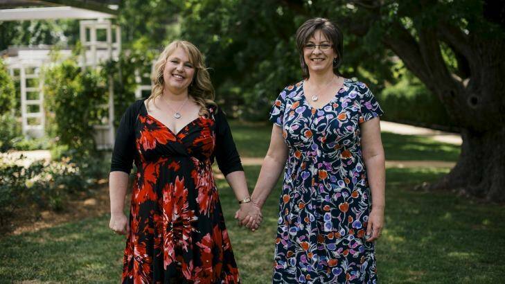 Glenda and Jennifer Lloyd after their wedding ceremony at the Old Parliament House rose gardens last year. Photo: Rohan Thomson