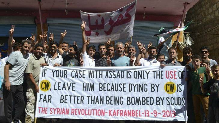 Villagers from Kafr Nabl in Syria's Idlib province send a message to the international community about the Assad regime's use of chemical weapons in 2013.  Photo: Supplied