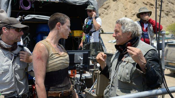 Charlize Theron with director George Miller.  Photo: Jasin Boland/Warner Bros. Entertainment Inc
