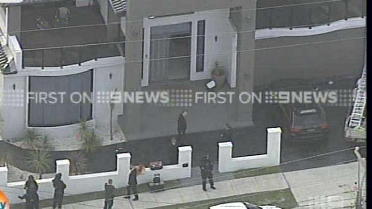 Police raiding properties in western Sydney on Wednesday morning. Photo: Channel NIne