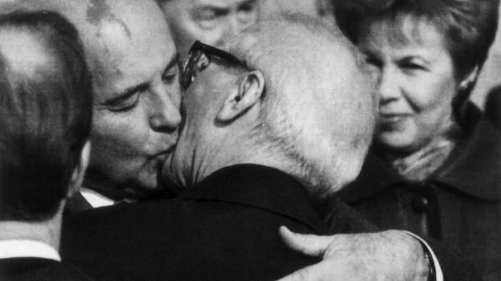 Mikhail Gorbachev and Erich Honecker greet each other in East Berlin in 1989.